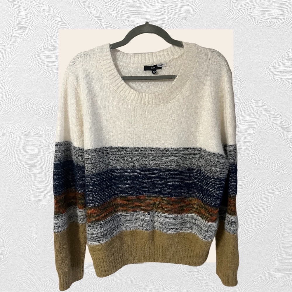 An awesome sweater by Fate in extra large